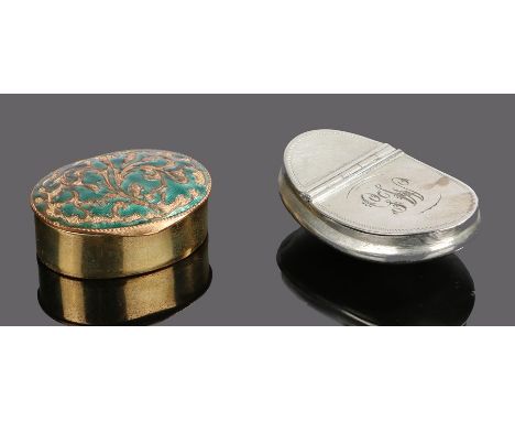 Two snuff boxes, the first a 19th Century example with a curved body and monogram, 5cm wide, the second with an enamel top, 4