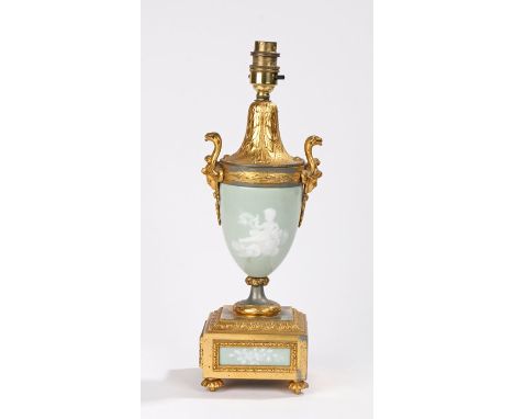 19th Century French pate sur pate and ormolu lamp by P H. Mourey, with acanthus leaf and mask decorated top section, the cent