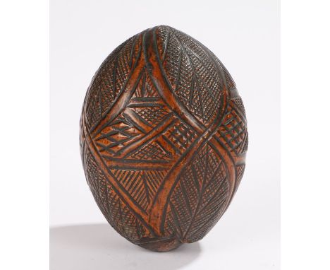 19th Century coconut bugbear flask, with carved geometric and leaf decoration, 