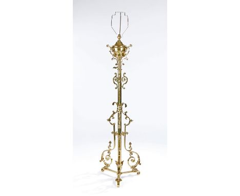 Victorian brass standard oil lamp, now converted to electricity, with scroll and acanthus leaf cast decoration