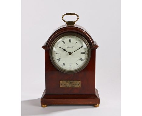 Edwardian mahogany mantel clock, with brass handle to the arched top, the enamel dial with Roman hours and Arabic outer minut