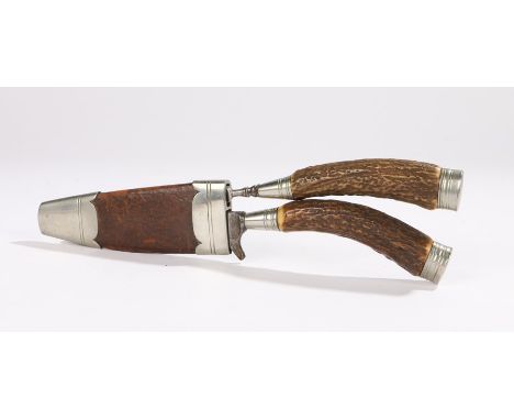 19th Century eating trosse, with a leather scabbard fitted with a fork and knife, 24cm long