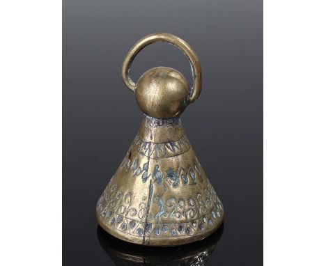 Brass seal of conical shape engraved with Islamic text to the base and a repeat pattern around the body includes a suspension