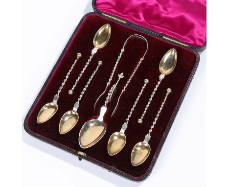 Cased set of Norwegian silver teaspoons, Maker R Iversen, consisting of six teaspoons with gilt bowls and twisted stems, matc