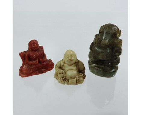 An Eastern jade coloured hardstone carving of Ganeshi, 4cm tall, together with a red hardstone figure of a seated deity, 3cm 
