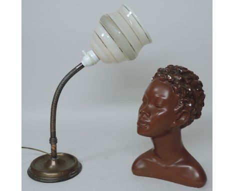 An Art Deco painted plaster bust, 30cm tall, together with an angle poise lamp, with a glass shade