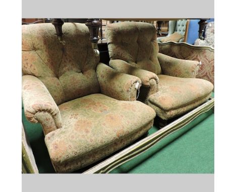 A pair of floral upholstered button back armchairs