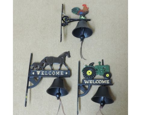 A horse bell, together with a tractor bell and a cockerel bell, tallest 34cm
