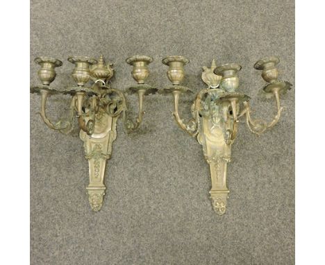 A pair of 19th century French bronze three branch wall sconces, 32cm tall