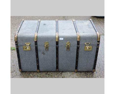 A 20th century cane bound travel trunk, 91cm, together with two mirrors and a folding tray