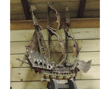 A large painted wooden model of a tall ship, 89cm tall