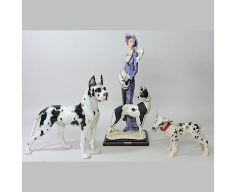 A large Capodimonte figure, Florence, dated 1987, 49cm tall, together with a Ronzan Italian pottery model of a Great Dane and