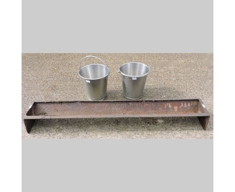 An iron pig trough, 150cm, together with a stainless steel milking pail and another