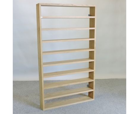 A modern oak wall shelf, 88cm