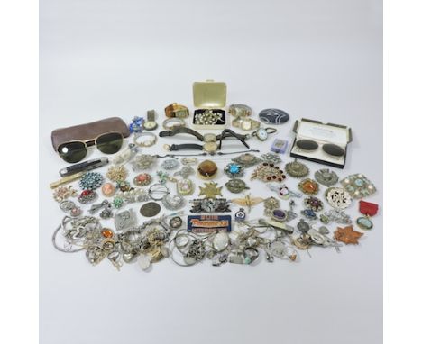 A Victorian amethyst and seed pearl brooch, together with a collection of costume jewellery brooches, various wristwatches, a