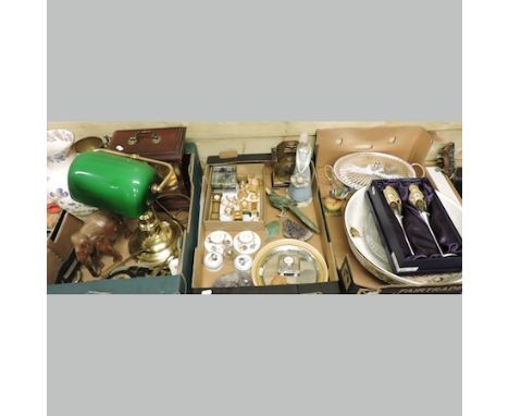 Three boxes of items, to include a brass desk lamp, clocks, horse brasses, Wedgwood candlesticks, a continental figure of a l