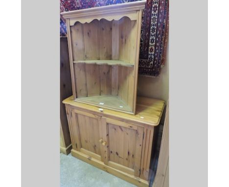 A modern pine two door cabinet, 96cm, together with a pine corner shelf