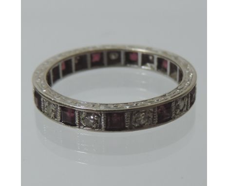 An early 20th century ruby and diamond set full hoop eternity ring