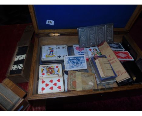 OAK WOODEN BOX OF PLAYING CARDS ,PUZZLES ,DOMINOES ANTON REICHE DRESDEN NACH10371 CHOCOLATE MOLD &amp; OTHER ITEMS EST[£10-£2