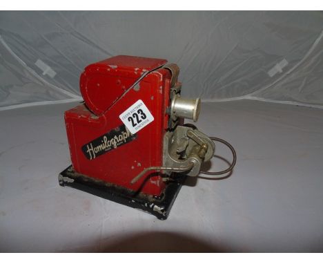 HOMILOGRAPH VINTAGE TIN PLATE TOY PROJECTOR EST[£20-£40]