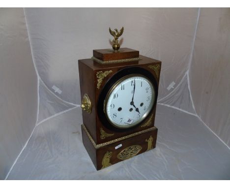 JUNGHANS WALNUT MANTLE CLOCK. A CONVEX DIAL WITH BRASS MOUNTS .HANDLES &amp; FINIAL 4 HAMMER WESTMINSTER CHIME MOVEMENT BASE 