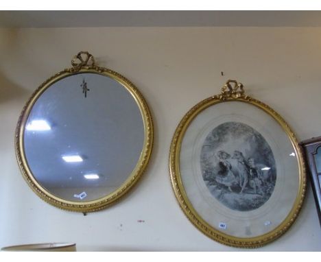 A PAIR OF EARLY 19TH C OVAL GILT FRAMED COMPOSITIONS OF A  MIRROR &amp; AN CHILDRENS LITHOGRAPH BY L CHEMAR EST [£80-£120]