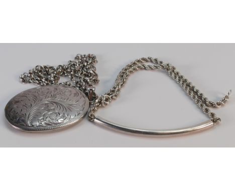 Silver jewellery items: including bracelet and necklace with large oval locket, 48 grams. (2)