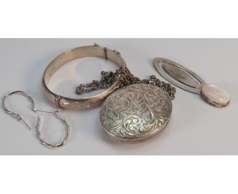 Group of silver jewellery: Includes large oval silver locket & chain, hollow bangle, bookmark & earrings.