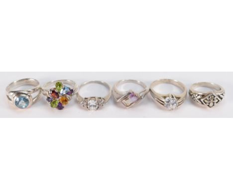 A collection of ladies Silver dress rings set with semi precious stones, 33 grams. (6)