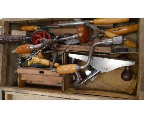 A collection of vintage Woodworking hand tools to include: boxed Record plane, chisels, hand drills etc 