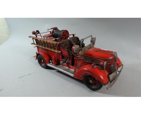 A Reproduction Tin Plate Model of an American Fire Engine, 38cm Long 