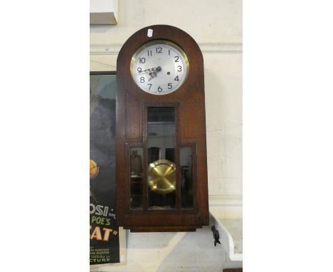 An Art Deco Oak Cased Wall Clock by Enfield, Working Order, 63cm High 