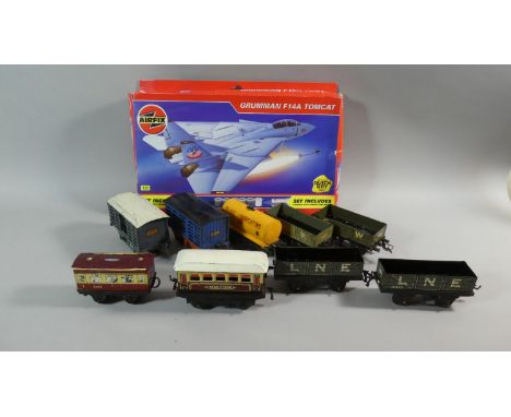 A Collection of Nine Unboxed Tin-Plate Meccano Hornby Wagons in O Gauge to include Two LNE Coal Trucks, Two GW Coal Trucks, R