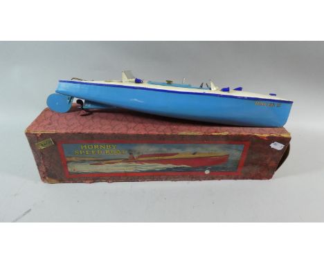 A Boxed Clock-work Hornby Speed Boat Named Racer III in Blue and White. 