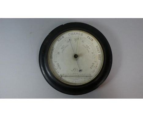 A Circular Wall Handing Barometer with Thermometer, 27cm Diameter 