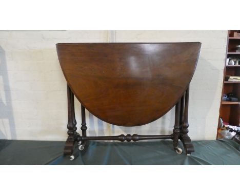 A Late Victorian Drop Leaf Mahogany Sutherland Table on Turned Supports and Stretcher with Brass and Ceramic Casters, 88cm Wi