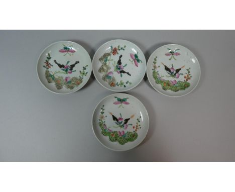 A Collection of Chinese Famille Rose Dishes with Applied Enamels Depicting Butterflies in Flight Amongst Foliage, Red Seal Ma