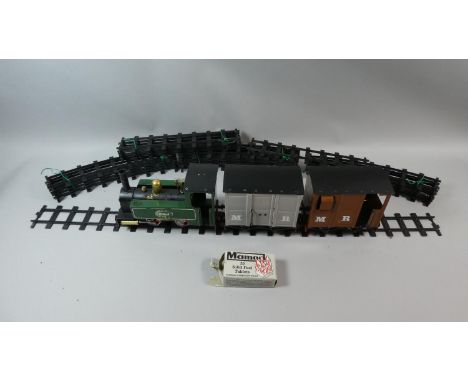 An Unboxed Used Mamod Live Steam Railway Engine in Green with Two Wagons, Track and Half Pack of Solid Fuel Tablets. 