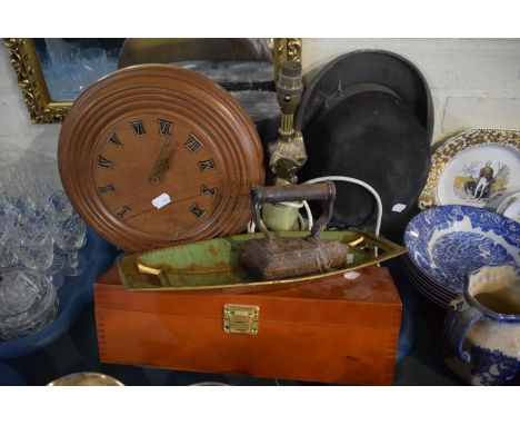 A Tray of Sundries to Include Wall Clock, Bowler Hat, Flat Iron, Wooden Box, Table Lamp Etc 