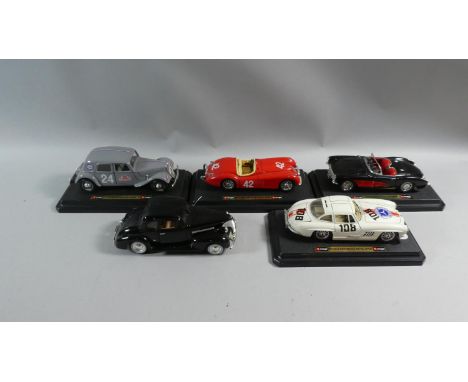 A Collection of Five 1:24 Scale Cars by Burago comprising 1948 Jaguar XJ120 Roadster, 1957 Chevrolet Corvette, 1939 Chevrolet