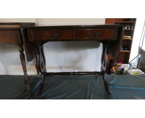 A Reproduction Mahogany Drop Leaf Sofa Table with Two Drawers on Lyre Supports, 89cm Wide When Closed 