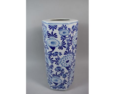 An Oriental Blue and White Glazed Hexagonal Stick Stand Decorated with Chrysanthemums, 45cm High 