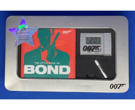 James Bond Souvenir collection includes The Little Book of Bond, Alarm Clock and Keyring light all housed in a metal display 