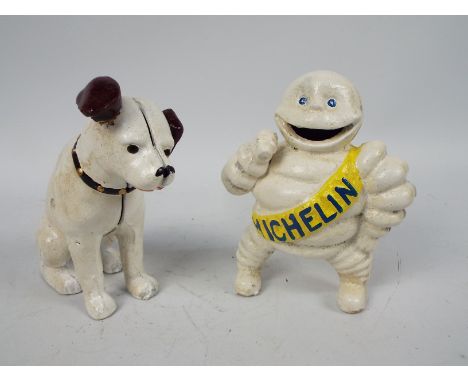 A cast iron money bank in the form of Nipper the HMV dog and a Bibendum (Michelin Man) figure, largest approximately 15 cm (h