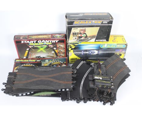 Scalextric - A large quantity of used Scalextric track, a 49 x 38 x 25 cm box full, also includes several boxed accessories #