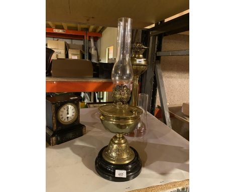 A BRASS OIL LAMP WITH GLASS FUNNEL (HEIGHT APPROXIMATELY 55 CM) 