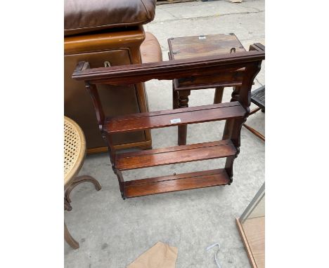 A MAHOGANY FOUR TIER WALL SHELF 