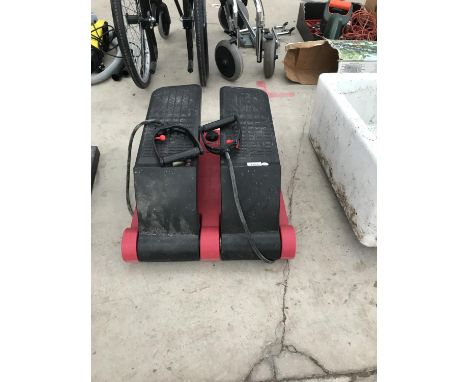 AN EXERCISE STEP MACHINE 