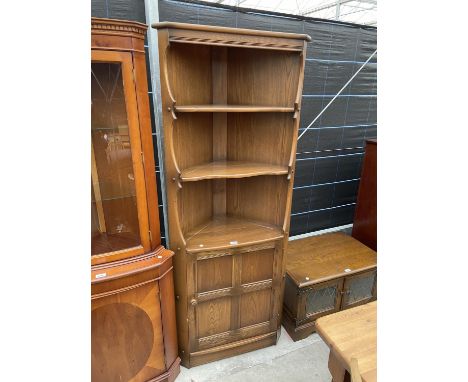 AN ERCOL ELM CORNER CABINET WITH LOWER DOOR AND TWO SHELVES - 30" WIDE 