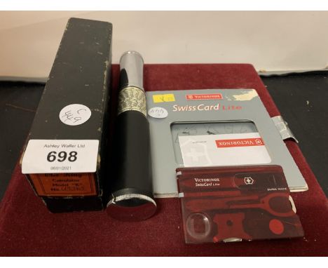 AN OTIS KING'S PATENT CALCULATOR MODEL 'K' AND A VICTORINOX SWISS CARD LITE 